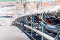 Outdoor incline large conveyor with rubber belt conveyor for transportation line for processing the coal in the coal mine. Royalty Free Stock Photo