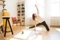 Woman stretching in room at home. Healthy and sport lifestyle. Fitness sport girl doing yoga fitness exercise. Royalty Free Stock Photo