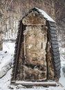 Outdoor insulated wooden toilet in northern Siberia