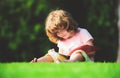 Outdoor kids learning. Little child boy drawing by pencil. Creative kid artistic, creativity early education. Royalty Free Stock Photo