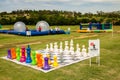 Outdoor Lawn Chess in a park on a sunny summer day