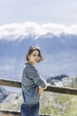 Outdoor lifestyle image, portrait of pretty girl posing at amazing mountains background