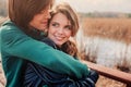 Outdoor lifestyle portrait of young happy couple