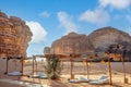 Outdoor lounge in front of elephant rock erosion monolith standing in the desert, Al Ula, Saudi Arabia Royalty Free Stock Photo