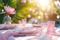 Outdoor lunch table setting with flowers. Romantic table setting with tablecloth, plates, crystal goblets, beautiful Royalty Free Stock Photo