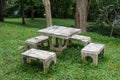 Outdoor marble table and four chairs.