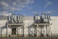 Outdoor metall air ducts ventilation system of a factory modern industry against blue sky