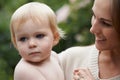 Outdoor, mom and holding baby in garden with love and support in backyard. Infant, bonding and relax with mother in Royalty Free Stock Photo