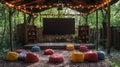 Outdoor movie screen, forest setting, beanbag seating Royalty Free Stock Photo