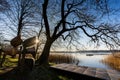 Outdoor park bench overlooking Lake Bagsvaerd, surrounded by lush foliage