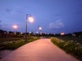 Outdoor Park with street light and path way.