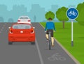 Outdoor parking rules. Traffic regulation tips. Safety bicycle riding. Back view of parked cars and cyclist on a bike lane.