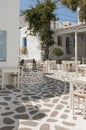 Outdoor part of a Greek taverna on the street Royalty Free Stock Photo