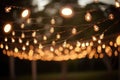 Outdoor party string lights hanging in backyard on bokeh background. Generative AI Royalty Free Stock Photo