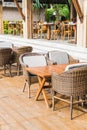 Outdoor patio with empty chair and table Royalty Free Stock Photo