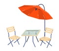 Outdoor patio furniture with orange umbrella and wooden chairs. Comfortable garden setup for relaxation. Cafe terrace or Royalty Free Stock Photo