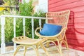 Outdoor patio seating area in house with nice rattan table Royalty Free Stock Photo