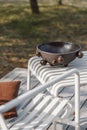 Outdoor patio terrace grey metal furniture on wooden deck. Cozy patio area with garden furniture. Exterior decoration concept. Royalty Free Stock Photo