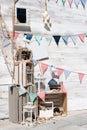 Outdoor photo zone with sea theme decoration. Summer vacation street photozone, flags, seagulls waiting for tourist to Royalty Free Stock Photo