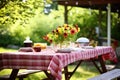 outdoor picnic table set for a barbecue meal Royalty Free Stock Photo