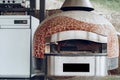 Outdoor pizza oven with mosaic decoratiion in a restaurant Royalty Free Stock Photo