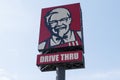 Outdoor pole billboard with logo KFC Brand with message Drive thru