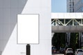 Outdoor pole vertical billboard with mock up white screen. Clipping path for mockup