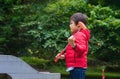 Outdoor Portrait active kid playing mini golf in the park, Cute boy playing crazy golf in the park, Children having fun playing