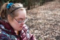 Outdoor portrait of an active 39 year old white woman with the Down Syndrome