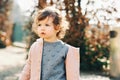 Outdoor portrait of adorable toddler girl with curly hair Royalty Free Stock Photo