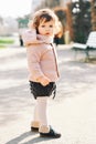 Outdoor portrait of adorable toddler girl with curly hair Royalty Free Stock Photo