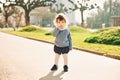 Outdoor portrait of adorable toddler girl with curly hair Royalty Free Stock Photo