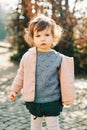 Outdoor portrait of adorable toddler girl with curly hair Royalty Free Stock Photo