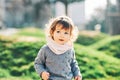 Outdoor portrait of adorable toddler girl with curly hair Royalty Free Stock Photo