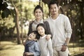 Outdoor portrait of asian family