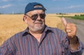 Outdoor portrait of a bearded senior man standing on a roadside Royalty Free Stock Photo