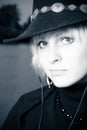 Outdoor portrait of beautiful cowgirl in hat