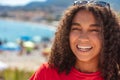 Mixed Race African American Girl Teenager Laughing By Beach Royalty Free Stock Photo