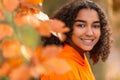 Happy Biracial Mixed Race African American Girl Teenager Smiling In Autumn or Fall Royalty Free Stock Photo