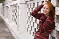 Outdoor portrait of beautiful redhair woman