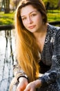 Outdoor portrait of beautiful serene young woman Royalty Free Stock Photo