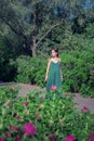 Outdoor portrait of a beautiful young woman in nature, enjoy summer holidays