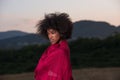 Outdoor portrait of a black woman with a scarf Royalty Free Stock Photo