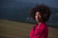 Outdoor portrait of a black woman with a scarf Royalty Free Stock Photo