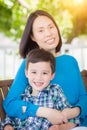 Outdoor Portrait of Chinese Mother with Her Mixed Race Chinese and Caucasian Young Boy