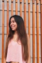 Outdoor portrait of a confident young woman posing in the street. Girl looking to the side. Female fashion. Sunny day. City Royalty Free Stock Photo