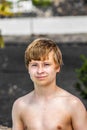 Outdoor portrait of cute handsome boy