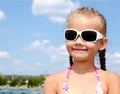 Outdoor portrait of cute little girl looking away Royalty Free Stock Photo