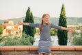 Outdoor portrait of a cute little girl of 8 years old