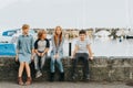 Outdoor portrait of 4 fashion kids Royalty Free Stock Photo